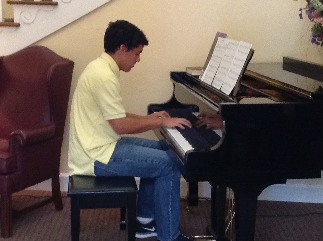 Piano students volunteer in the West Cobb community.